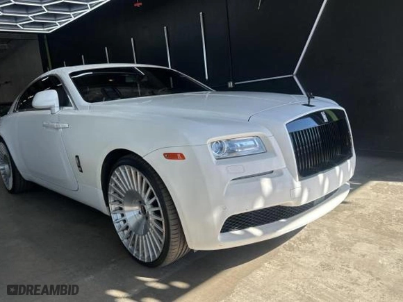 2015 Rolls-Royce Wraith with VIN SCA665C52FUX85482, listed as a Copart auction lot 77887554 with 99,781 mi miles and Salvage Title. Bid and sale history available at carsss.com. Image 1.