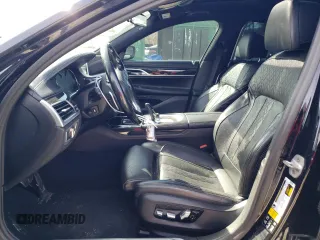 2019 BMW 7 Series 740i xDrive с VIN WBA7E4C51KGV70305, выставлен на аукционе Copart как лот 50009705 с пробегом 129 427 миль миль и Списание • Salvage title. История ставок и продаж доступна на DreamBid. Изображение 7.