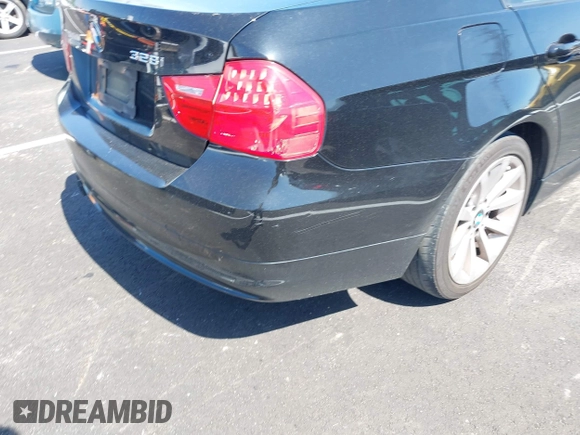 2011 BMW 3 Series 328i with VIN WBAPH7G50BNM56021, listed as a IAAI auction lot 42006563 with 178,919 mi miles. Bid and sale history available at carsss.com. Image 6.