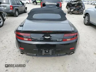 2009 Aston Martin Vantage z VIN SCFBF04CX9GD11942, wystawiony jako Copart lot #43771214 z przebiegiem 52 730 mil mil oraz . Historia ofert i sprzedaży dostępna na DreamBid. Obrazek 6.