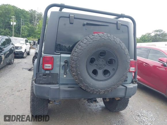 2015 Jeep Wrangler Unlimited Sport with VIN 1C4HJWDG1FL635620, listed as a IAAI auction lot 42396137 with 87,352 mi miles and . Bid and sale history available at DreamBid. Image 16.