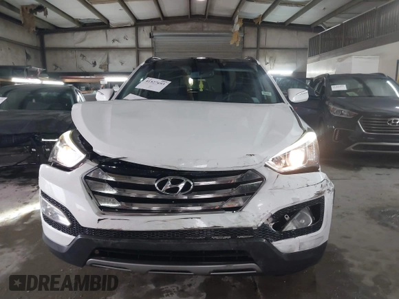 2014 Hyundai Santa Fe Sport with VIN 5XYZU3LB9EG140446, listed as a IAAI auction lot 41527693 with 129,610 mi miles. Bid and sale history available at carsss.com. Image 12.
