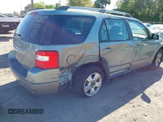 2005 Ford Freestyle SEL with VIN 1FMZK021X5GA46212, listed as a IAAI auction lot 41779597 with 147,994 mi miles. Bid and sale history available at carsss.com. Image 4.