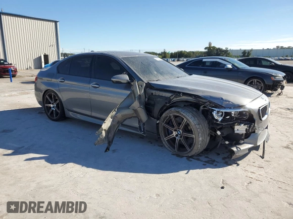 2014 BMW M5 with VIN WBSFV9C52ED097797, listed as a Copart auction lot 81085504 with 83,990 mi miles and Salvage Title. Bid and sale history available at carsss.com. Image 4.