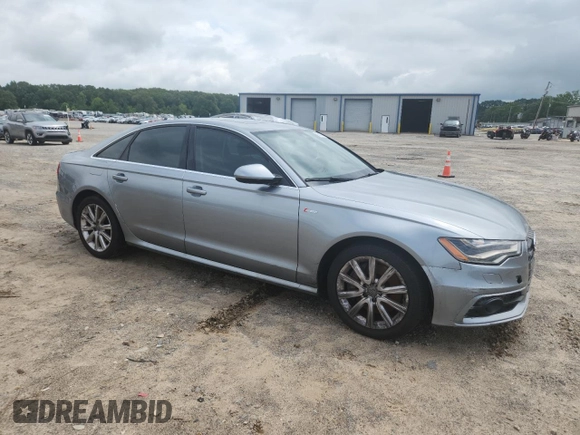 2012 Audi A6 Prestige with VIN WAUJGAFC2CN070787, listed as a Copart auction lot 60617945 with 193,589 mi miles and Salvage title. Bid and sale history available at DreamBid. Image 4.