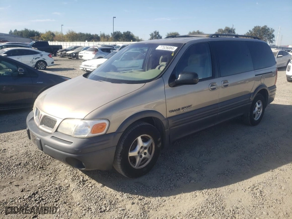 1997 Pontiac Montana with VIN 1GMDX03EXVD290246, listed as a Copart auction lot 77526084 with 127,447 mi miles and Salvage Title. Bid and sale history available at carsss.com. Image 1.