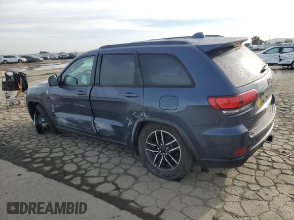 2021 Jeep Grand Cherokee Trailhawk with VIN 1C4RJFLG0MC525273, listed as a Copart auction lot 49632275 with 57,452 mi miles and Salvage title. Bid and sale history available at DreamBid. Image 2.