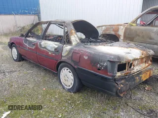 1991 Toyota Camry z VIN JT2SV21EXM3434326, wystawiony jako IAAI lot #40994388 z przebiegiem Nie podano mil oraz . Historia ofert i sprzedaży dostępna na DreamBid. Obrazek 3.