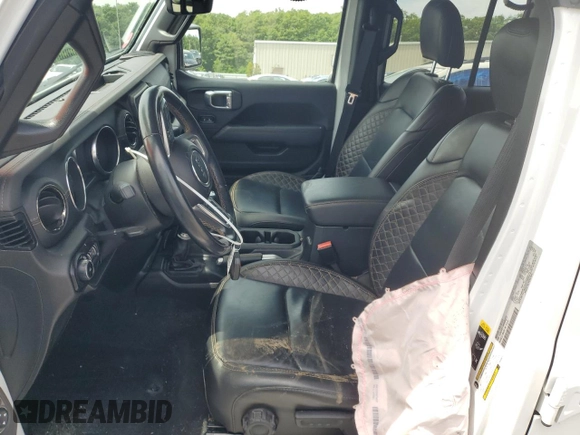 2021 Jeep Wrangler Unlimited Sahara Altitude with VIN 1C4HJXEG1MW586273, listed as a Copart auction lot 61723485 with 76,236 mi miles and Salvage title. Bid and sale history available at DreamBid. Image 7.