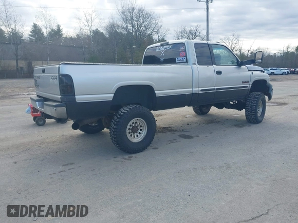 2001 Dodge 2500 with VIN 1B7KF23641J597636, listed as a IAAI auction lot 41843898 with 257,007 mi miles. Bid and sale history available at carsss.com. Image 4.