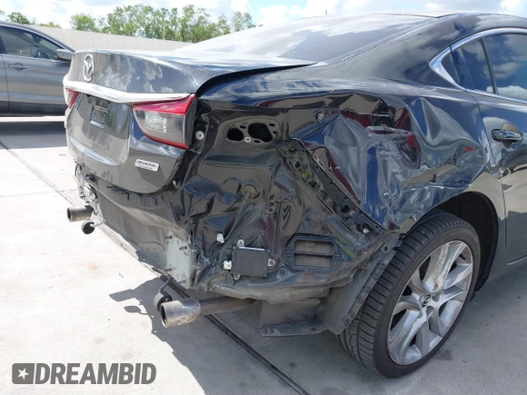 2016 Mazda Mazda6 i Touring with VIN JM1GJ1V53G1430339, listed as a IAAI auction lot 40696335 with 88,433 mi miles. Bid and sale history available at carsss.com. Image 18.