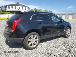 2015 Cadillac SRX Premium Collection z VIN 3GYFNGE30FS634363, wystawiony jako Copart lot #57216215 z przebiegiem 146 818 mil mil oraz Tytuł czysty. Historia ofert i sprzedaży dostępna na DreamBid. Obrazek 3.