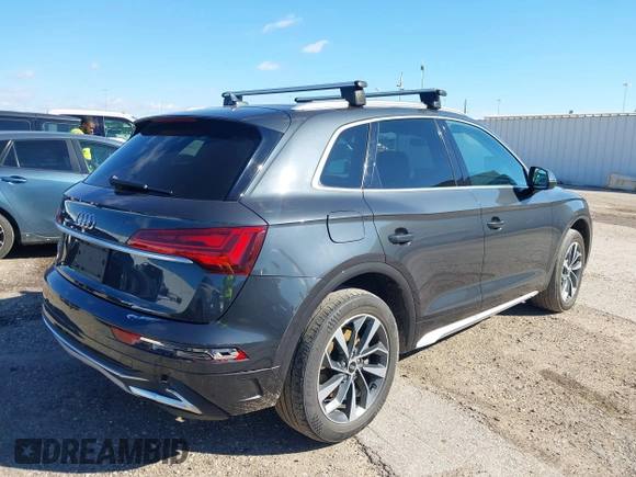 2021 Audi Q5 Premium Plus z VIN WA1BAAFY6M2013249, wystawiony jako IAAI lot #38681569 z przebiegiem 68 694 mil mil oraz . Historia ofert i sprzedaży dostępna na DreamBid. Obrazek 4.