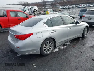 2014 Infiniti Q50 Hybrid Premium with VIN JN1AV7AR9EM700727, listed as a IAAI auction lot 41461433 with 169,882 mi miles. Bid and sale history available at carsss.com. Image 4.