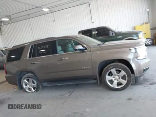 2016 Chevrolet Tahoe LT with VIN 1GNSKBKC9GR172076, listed as a IAAI auction lot 42223918 with 92,348 mi miles and . Bid and sale history available at DreamBid. Image 13.