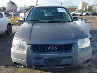 2004 Ford Escape with VIN 1FMCU02174KA61956, listed as a IAAI auction lot 41913605 with 166,587 mi miles and . Bid and sale history available at DreamBid. Image 6.