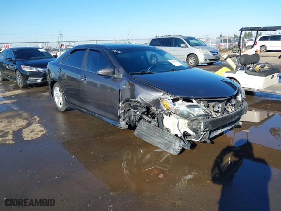 2014 Toyota Camry Hybrid LE with VIN 4T1BD1FK8EU135234, listed as a IAAI auction lot 41399246 with 104,964 mi miles. Bid and sale history available at carsss.com. Image 1.