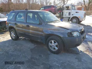2003 Ford Escape XLS Popular with VIN 1FMYU02103KE02490, listed as a IAAI auction lot 41326202 with 190,280 mi miles. Bid and sale history available at carsss.com. Image 1.