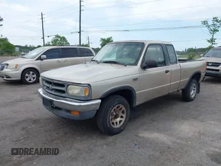1997 Mazda B-Series Truck LE z VIN 4F4DR17X5VTM29258, wystawiony jako IAAI lot #42205942 z przebiegiem 271 473 mil mil oraz . Historia ofert i sprzedaży dostępna na DreamBid. Obrazek 2.