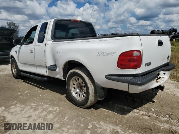 2001 Ford F-150 XL with VIN 1FTRX07L81KF40897, listed as a Copart auction lot 73887094 with 0 mi miles and Salvage Title. Bid and sale history available at carsss.com. Image 2.