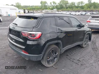 2021 Jeep Compass Latitude with VIN 3C4NJDBB6MT590092, listed as a IAAI auction lot 42351097 with 72,428 mi miles and . Bid and sale history available at DreamBid. Image 4.