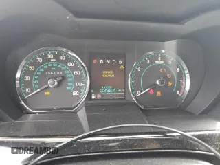 2013 Jaguar XK with VIN SAJWA4FB2DLB50515, listed as a Copart auction lot 66511554 with 147,876 mi miles and Salvage Title. Bid and sale history available at carsss.com. Image 9.