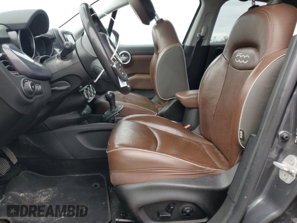 2017 FIAT 500X Lounge z VIN ZFBCFYDB9HP624651, wystawiony jako Copart lot #73388714 z przebiegiem 70 597 mil mil oraz Szkoda całkowita • Salvage title. Historia ofert i sprzedaży dostępna na DreamBid. Obrazek 7.