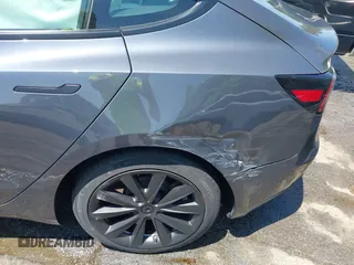 2023 Tesla Model 3 z VIN 5YJ3E1EA7PF413311, wystawiony jako IAAI lot #42442055 z przebiegiem 25 270 mil mil oraz . Historia ofert i sprzedaży dostępna na DreamBid. Obrazek 21.