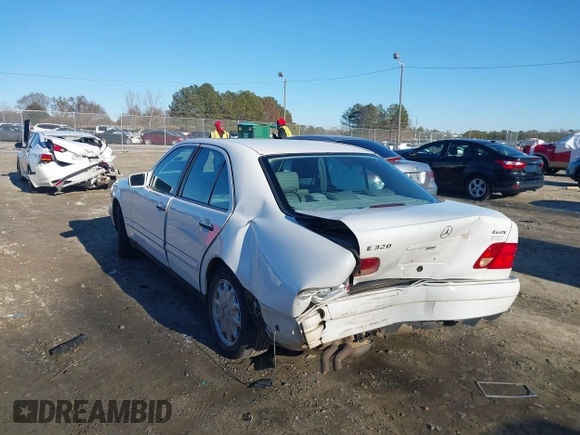 1999 Mercedes-Benz E-Class with VIN WDBJF82H0XX015778, listed as a IAAI auction lot 41269886 with 184,011 mi miles. Bid and sale history available at carsss.com. Image 6.
