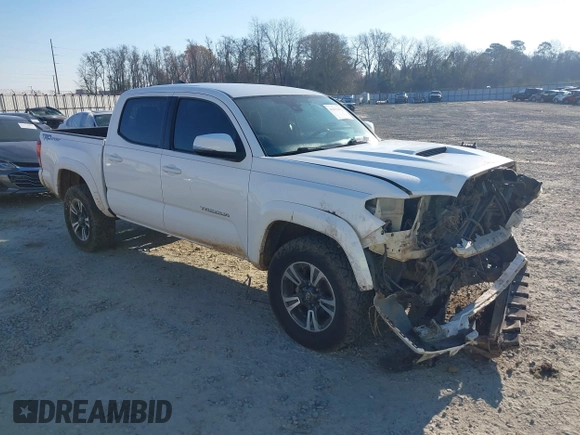 2018 Toyota Tacoma SR5 with VIN 3TMAZ5CN4JM062272, listed as a IAAI auction lot 41671472 with 114,566 mi miles and . Bid and sale history available at DreamBid. Image 1.