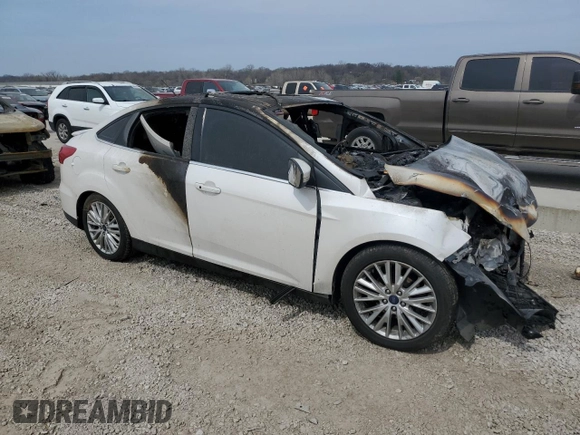2017 Ford Focus Titanium с VIN 1FADP3J29HL245054, выставлен на аукционе Copart как лот 50784925 с пробегом Не указан миль и На запчасти • Non repairable. История ставок и продаж доступна на DreamBid. Изображение 4.