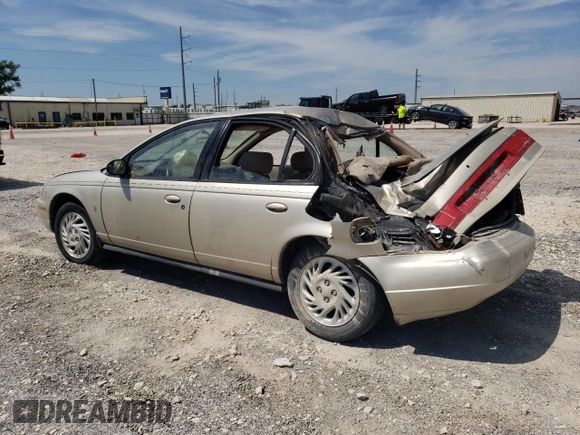 1998 Saturn SL z VIN 1G8ZK5271WZ265579, wystawiony jako Copart lot #68153934 z przebiegiem Nie podano mil oraz Szkoda całkowita • Salvage title. Historia ofert i sprzedaży dostępna na DreamBid. Obrazek 2.