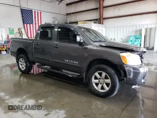 2012 Nissan Titan S with VIN 1N6AA0EC7CN311143, listed as a Copart auction lot 75181784 with 214,351 mi miles and Salvage Title. Bid and sale history available at carsss.com. Image 4.