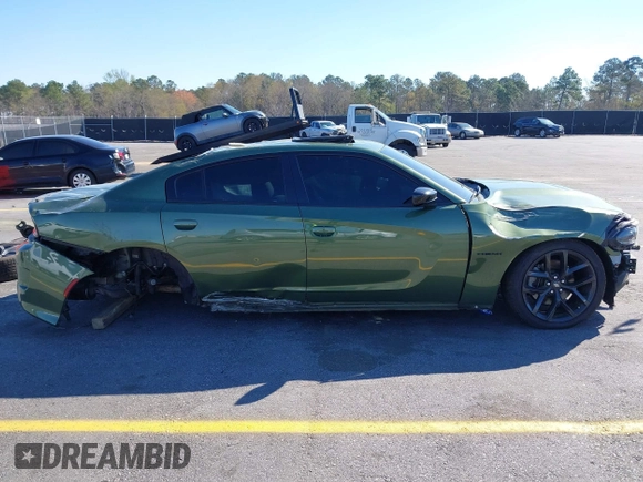 2022 Dodge Charger R/T with VIN 2C3CDXCT9NH114490, listed as a IAAI auction lot 41845091 with 75,382 mi miles and . Bid and sale history available at DreamBid. Image 14.