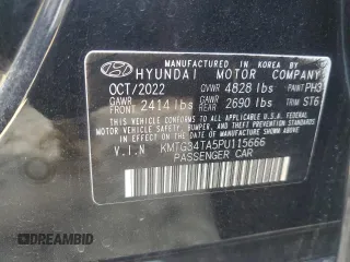 2023 Genesis G70 2.0T with VIN KMTG34TA5PU115666, listed as a Copart auction lot 78907334 with 19,747 mi miles and Salvage Title. Bid and sale history available at DreamBid. Image 12.
