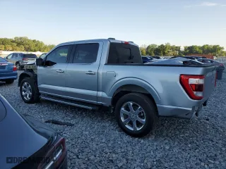 2021 Ford F-150 XL with VIN 1FTEW1C8XMKE52138, listed as a Copart auction lot 52744615 with 127,833 mi miles and Salvage Title. Bid and sale history available at carsss.com. Image 2.