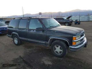 1999 Chevrolet Tahoe with VIN 1GNEC13R4XJ568244, listed as a Copart auction lot 85397504 with 111,327 mi miles and Clean Title. Bid and sale history available at carsss.com. Image 4.