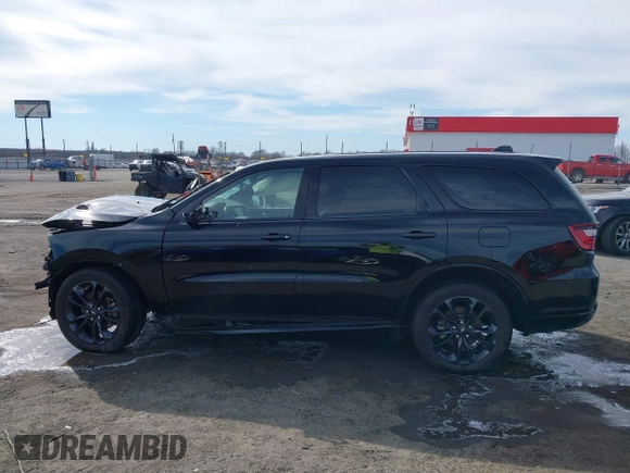 2022 Dodge Durango R/T with VIN 1C4SDJCT0NC133162, listed as a IAAI auction lot 41651237 with 96,208 mi miles and . Bid and sale history available at DreamBid. Image 13.