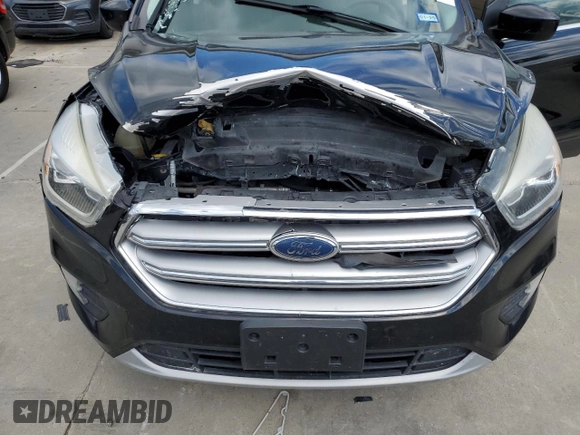 2017 Ford Escape SE z VIN 1FMCU0G93HUF10560, wystawiony jako Copart lot #57973915 z przebiegiem 127 444 mil mil oraz Czysty tytuł • Clean title. Historia ofert i sprzedaży dostępna na DreamBid. Obrazek 12.