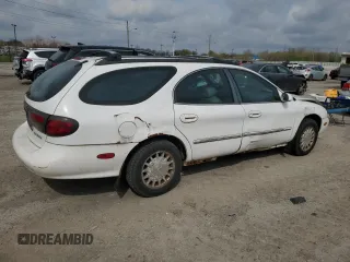 1999 Mercury Sable z VIN 1MEFM58U7XA652331, wystawiony jako Copart lot #49919194 z przebiegiem 143 835 mil mil oraz Szkody całkowita. Historia ofert i sprzedaży dostępna na DreamBid. Obrazek 3.