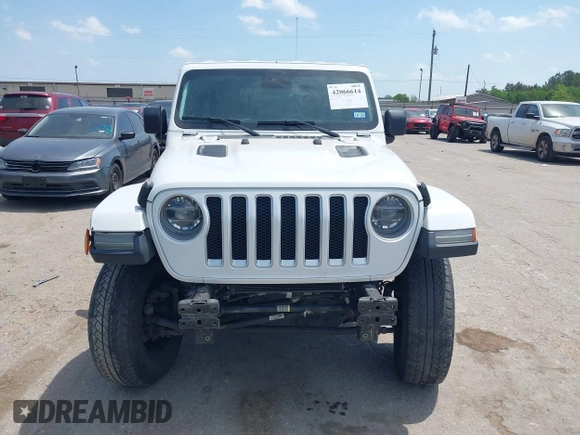 2018 Jeep Wrangler Unlimited Sahara z VIN 1C4HJXEG0JW245118, wystawiony jako IAAI lot #42066614 z przebiegiem 83 743 mil mil oraz . Historia ofert i sprzedaży dostępna na DreamBid. Obrazek 13.