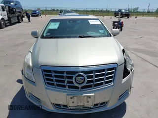 2014 Cadillac XTS Premium with VIN 2G61P5S33E9157607, listed as a IAAI auction lot 42004612 with 111,047 mi miles and . Bid and sale history available at DreamBid. Image 12.