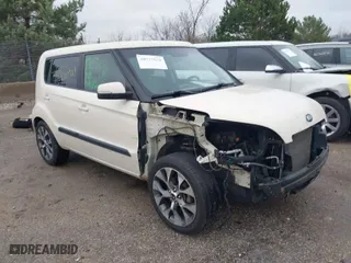 2013 Kia Soul + with VIN KNDJT2A69D7575284, listed as a IAAI auction lot 40777034 with 136,912 mi miles. Bid and sale history available at carsss.com. Image 1.