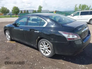 2014 Nissan Maxima SV with VIN 1N4AA5AP3EC487667, listed as a IAAI auction lot 42356793 with 164,601 mi miles and . Bid and sale history available at DreamBid. Image 3.