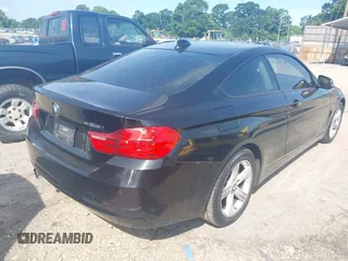 2014 BMW 4 Series 428i xDrive with VIN WBA3N5C52EF716998, listed as a IAAI auction lot 42548467 with 212,418 mi miles and . Bid and sale history available at DreamBid. Image 4.