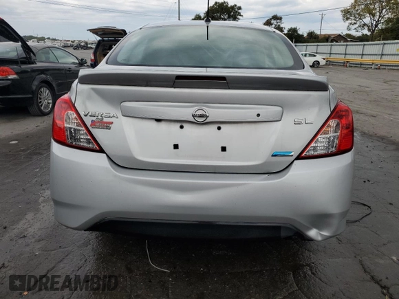 2016 Nissan Versa SV with VIN 3N1CN7AP3GL856749, listed as a Copart auction lot 70014214 with 84,975 mi miles and Salvage Title. Bid and sale history available at DreamBid. Image 6.