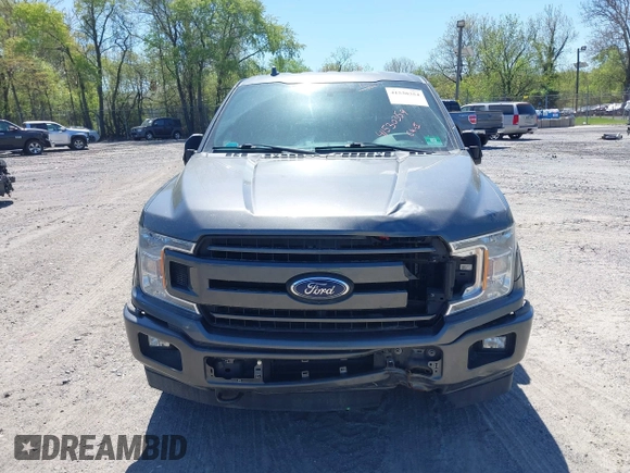 2018 Ford F-150 XL with VIN 1FTEW1EG2JFE55513, listed as a IAAI auction lot 41530354 with 132,617 mi miles. Bid and sale history available at carsss.com. Image 12.