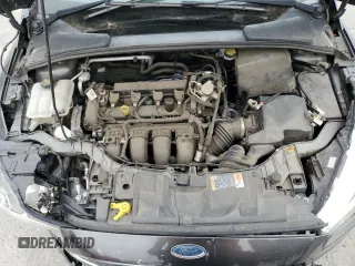 2016 Ford Focus SE z VIN 1FADP3F23GL405565, wystawiony jako Copart lot #60173935 z przebiegiem 82 167 mil mil oraz Szkoda całkowita • Salvage title. Historia ofert i sprzedaży dostępna na DreamBid. Obrazek 11.