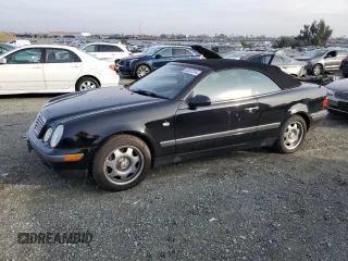 1999 Mercedes-Benz CLK with VIN WDBLK65G1XT007711, listed as a Copart auction lot 85287314 with Not Provided miles and Salvage Title. Bid and sale history available at carsss.com. Image 1.