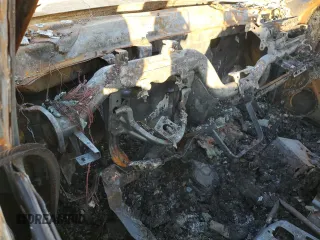 2007 Chevrolet Tahoe LT z VIN 1GNFC13057J143850, wystawiony jako Copart lot #89405105 z przebiegiem Nie podano mil oraz Nie do naprawy • Non repairable. Historia ofert i sprzedaży dostępna na DreamBid. Obrazek 9.